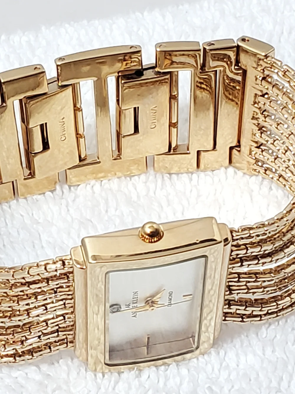 Anne Klein Watch Women's Gold Tone Multi Strand Chain Diamond Watch Silver Dial